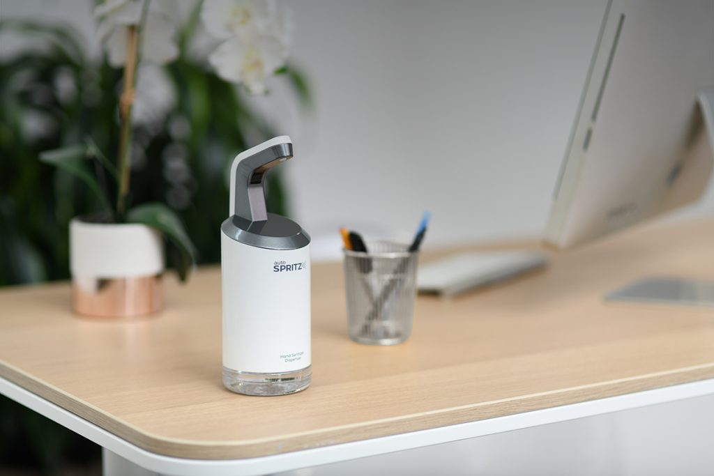 Hand sanitizer dispenser on desk